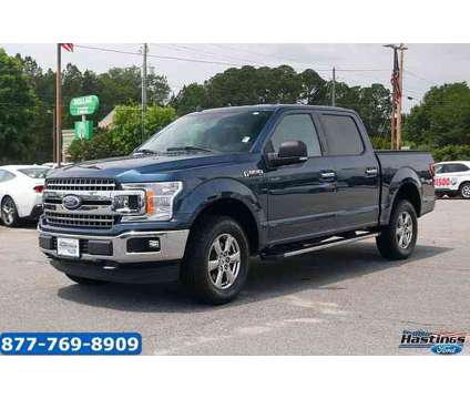 2018 Ford F-150 XLT is a Blue 2018 Ford F-150 XLT Truck in Greenville NC