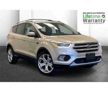 2017 Ford Escape Titanium is a Gold, White 2017 Ford Escape Titanium SUV in Fredericksburg VA