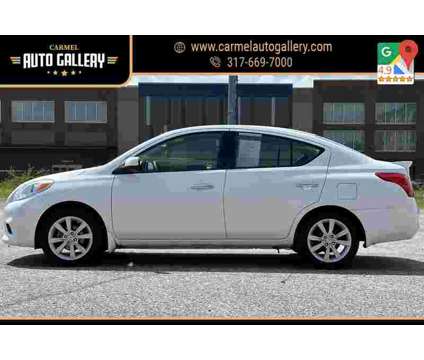 2014 Nissan Versa 1.6 SL is a White 2014 Nissan Versa 1.6 SL Sedan in Carmel IN