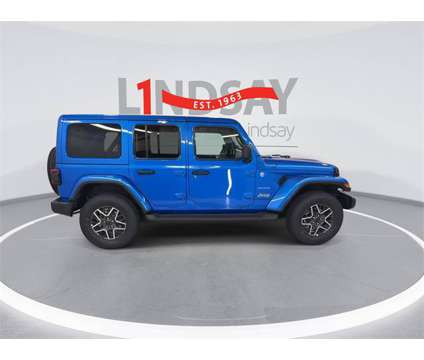 2024 Jeep Wrangler Sahara is a Blue 2024 Jeep Wrangler Sahara SUV in Manassas VA