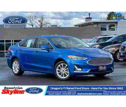 2020 Ford Fusion Energi Titanium is a Blue 2020 Ford Fusion Energi Titanium Sedan in Salem OR
