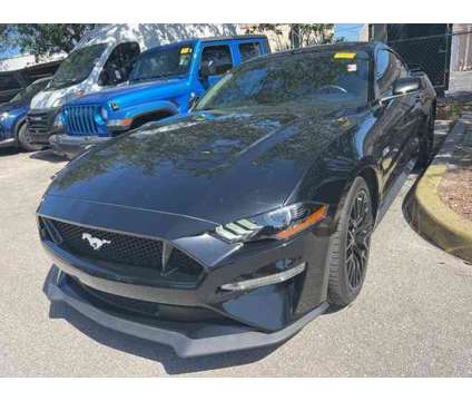 2019 Ford Mustang GT Premium is a Black 2019 Ford Mustang GT Premium Coupe in Naples FL