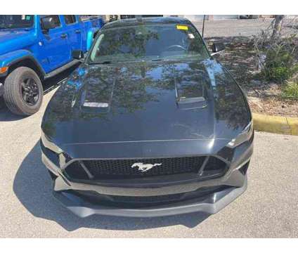 2019 Ford Mustang GT Premium is a Black 2019 Ford Mustang GT Premium Coupe in Naples FL