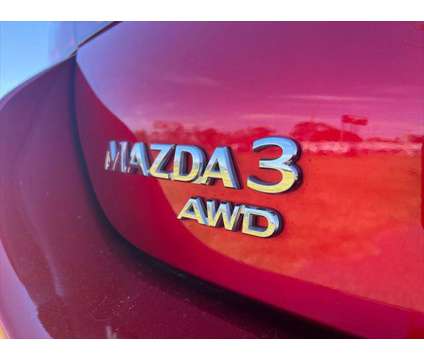2021 Mazda Mazda3 Sedan Premium is a Red 2021 Mazda MAZDA 3 sp Sedan in Brunswick GA