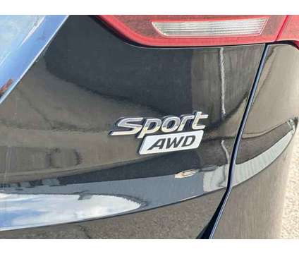 2018 Hyundai Santa Fe Sport 2.4L is a Black 2018 Hyundai Santa Fe Sport 2.4L SUV in Rochester MN