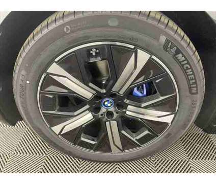 2025 BMW iX M60 is a Grey 2025 BMW 325 Model iX SUV in Freeport NY