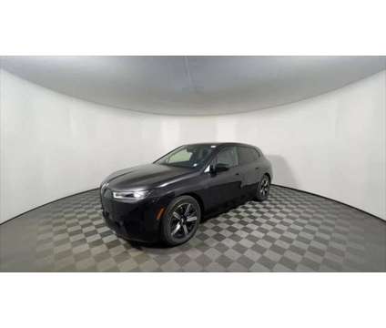 2025 BMW iX M60 is a Grey 2025 BMW 325 Model iX SUV in Freeport NY
