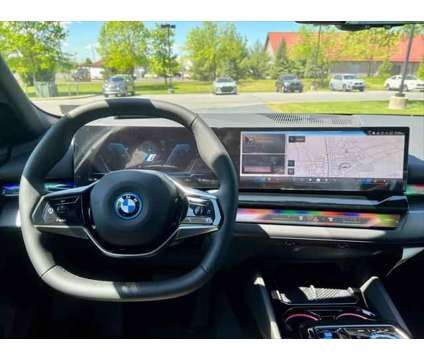 2025 BMW i5 xDrive40 is a Green 2025 Sedan in Mechanicsburg PA