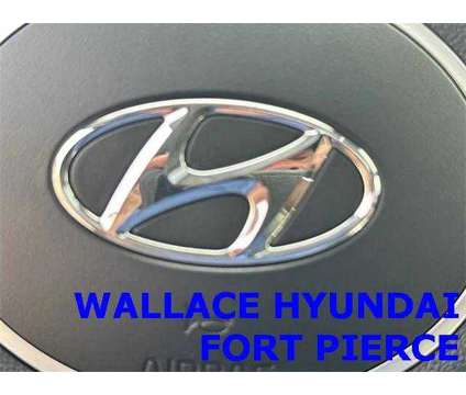 2022 Hyundai Tucson SEL is a Silver 2022 Hyundai Tucson SUV in Fort Pierce FL