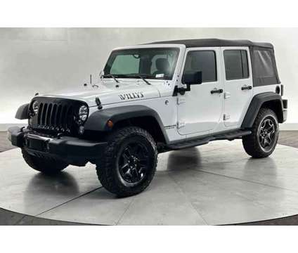 2016 Jeep Wrangler Unlimited Willys Wheeler is a White 2016 Jeep Wrangler Unlimited SUV in Saint George UT