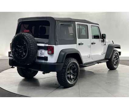 2016 Jeep Wrangler Unlimited Willys Wheeler is a White 2016 Jeep Wrangler Unlimited SUV in Saint George UT