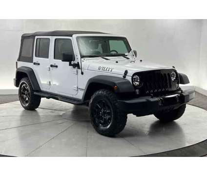 2016 Jeep Wrangler Unlimited Willys Wheeler is a White 2016 Jeep Wrangler Unlimited SUV in Saint George UT