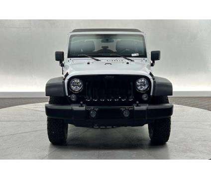 2016 Jeep Wrangler Unlimited Willys Wheeler is a White 2016 Jeep Wrangler Unlimited SUV in Saint George UT