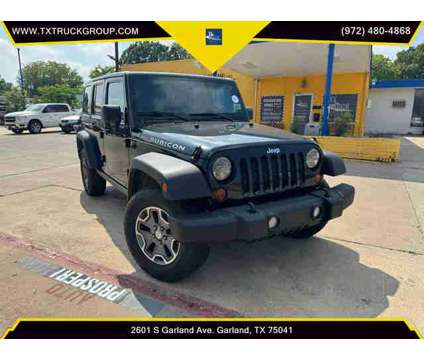 2013 Jeep Wrangler for sale is a Black 2013 Jeep Wrangler Car for Sale in Garland TX