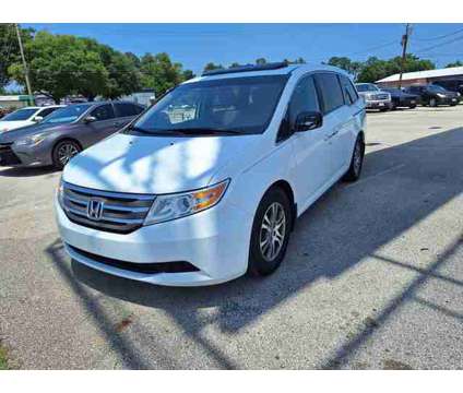 2012 Honda Odyssey for sale is a White 2012 Honda Odyssey Car for Sale in Conroe TX