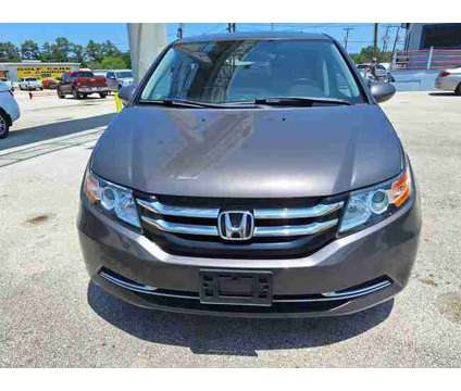 2016 Honda Odyssey for sale is a Grey 2016 Honda Odyssey Car for Sale in Conroe TX