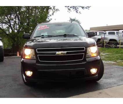 2010 Chevrolet Suburban 1500 for sale is a Black 2010 Chevrolet Suburban 1500 Trim Car for Sale in Kansas City KS