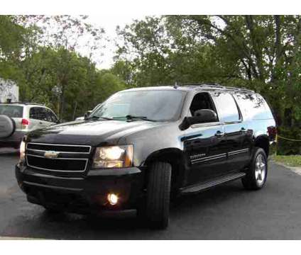 2010 Chevrolet Suburban 1500 for sale is a Black 2010 Chevrolet Suburban 1500 Trim Car for Sale in Kansas City KS