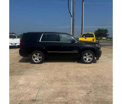 2015 Chevrolet Tahoe for sale is a Black 2015 Chevrolet Tahoe 1500 4dr Car for Sale in Burleson TX