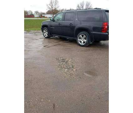 2011 Chevrolet Suburban 1500 for sale is a Black 2011 Chevrolet Suburban 1500 Trim Car for Sale in Hendrum MN