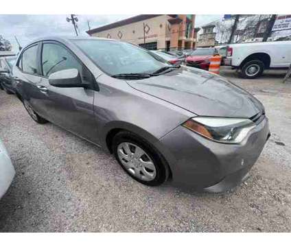 2015 Toyota Corolla for sale is a Brown 2015 Toyota Corolla Car for Sale in Houston TX