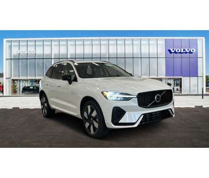 2024 Volvo XC60 Recharge Plug-In Hybrid Plus Dark Theme is a White 2024 Volvo XC60 3.2 Trim Hybrid in Barrington IL