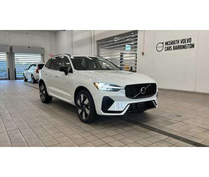 2024 Volvo XC60 Recharge Plug-In Hybrid Plus Dark Theme is a White 2024 Volvo XC60 3.2 Trim Hybrid in Barrington IL