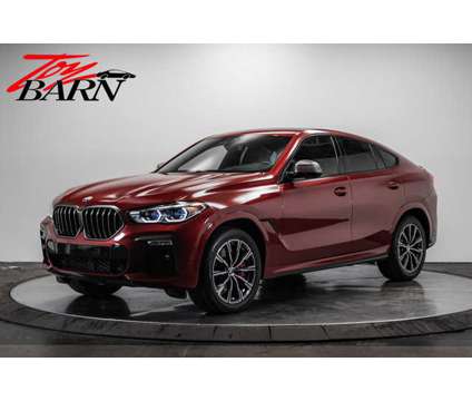 2021 BMW X6 M50i is a Red 2021 BMW X6 Car for Sale in Dublin OH