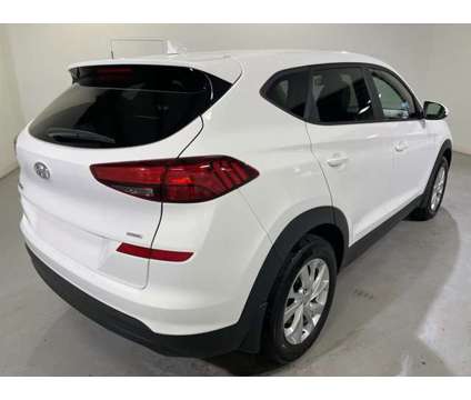 2021 Hyundai Tucson SE is a White 2021 Hyundai Tucson Car for Sale in Traverse City MI