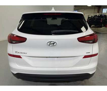 2021 Hyundai Tucson SE is a White 2021 Hyundai Tucson SE Car for Sale in Traverse City MI