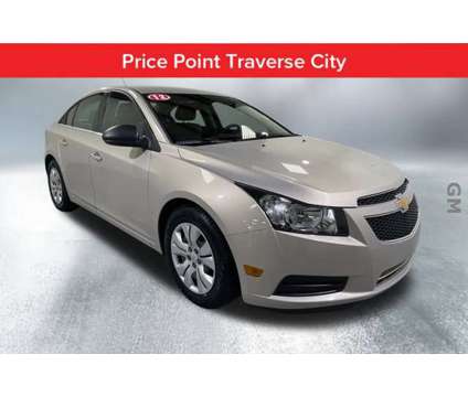 2012 Chevrolet Cruze LS is a Gold 2012 Chevrolet Cruze LS Car for Sale in Traverse City MI