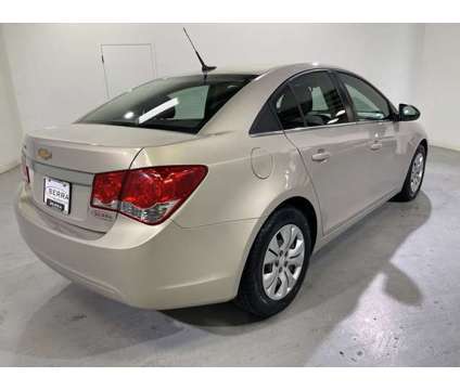 2012 Chevrolet Cruze LS is a Gold 2012 Chevrolet Cruze LS Car for Sale in Traverse City MI