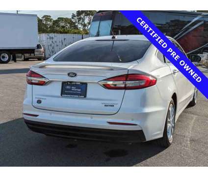 2020 Ford Fusion Energi Titanium is a Silver, White 2020 Ford Fusion Energi Titanium Car for Sale in Sarasota FL