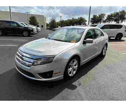 2012UsedFordUsedFusionUsed4dr Sdn FWD is a Silver 2012 Ford Fusion Car for Sale in Sanford FL