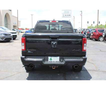 2021UsedRamUsed1500Used4x4 Quad Cab 6 4 Box is a Black 2021 RAM 1500 Model Truck in Greenwood IN