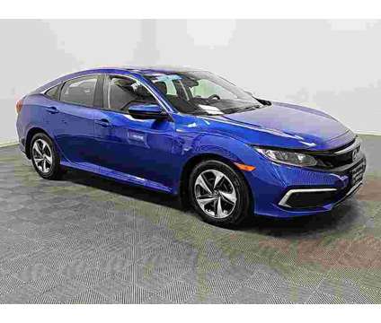 2021 Honda Civic LX is a Blue 2021 Honda Civic LX Sedan in Enterprise AL