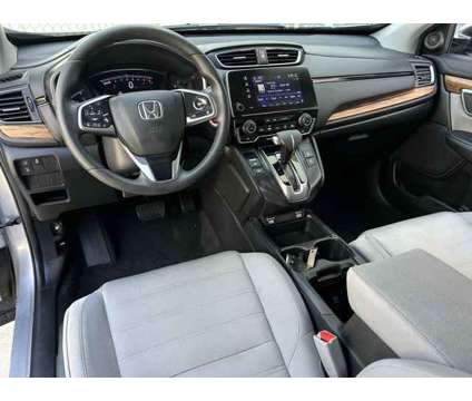 2020 Honda CR-V EX is a Silver 2020 Honda CR-V EX SUV in Baytown TX