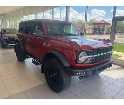 2022 Ford Bronco Wildtrak 4WD, SUV is a Red 2022 Ford Bronco SUV in Westland MI