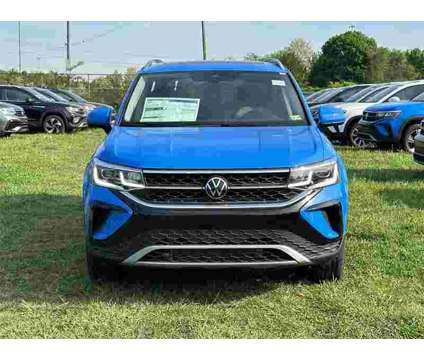 2024 Volkswagen Taos 1.5T SEL is a Blue 2024 1.5T SEL SUV in Sterling VA