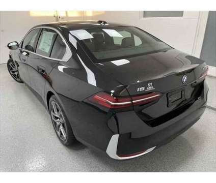 2025 BMW i5 xDrive40 is a Black 2025 Sedan in Erie PA