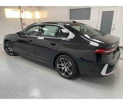 2025 BMW i5 xDrive40 is a Black 2025 Sedan in Erie PA
