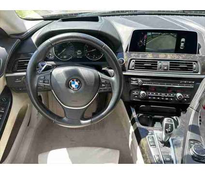 2016 BMW 6 Series xDrive is a Silver 2016 BMW 6-Series Sedan in Bowie MD