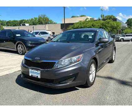 2011 Kia Optima LX is a Silver 2011 Kia Optima LX Sedan in Bowie MD