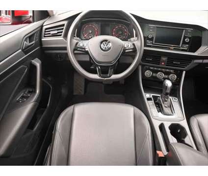 2020 Volkswagen Jetta 1.4T SE is a Black, Red 2020 Volkswagen Jetta 1.4T SE Sedan in Dubuque IA