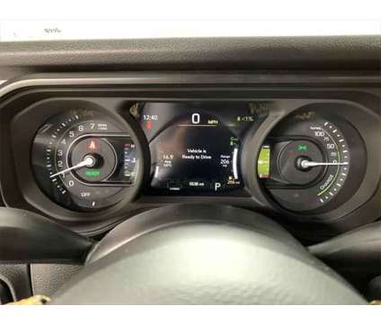 2024 Jeep Wrangler 4xe Willys is a Green 2024 Jeep Wrangler SUV in Cicero NY
