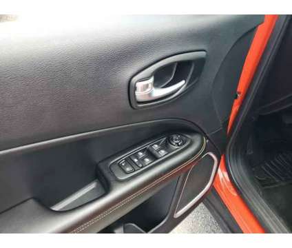 2021 Jeep Compass Sport 4x4 is a Orange 2021 Jeep Compass Sport SUV in Orlando FL
