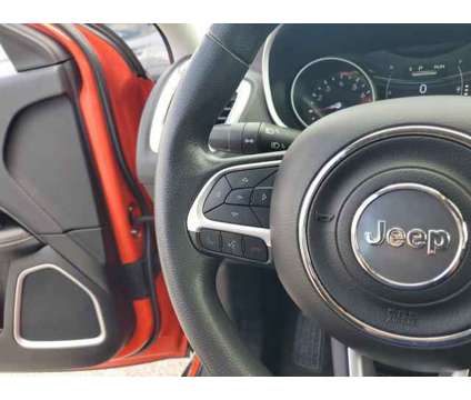 2021 Jeep Compass Sport 4x4 is a Orange 2021 Jeep Compass Sport SUV in Orlando FL