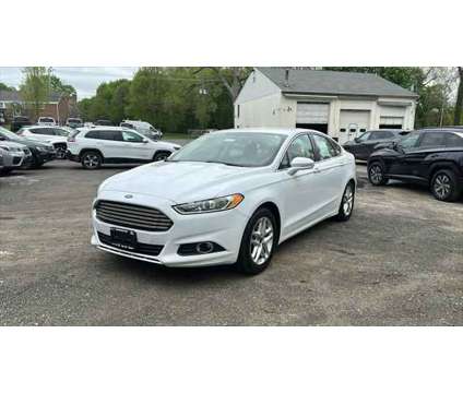 2015 Ford Fusion SE is a White 2015 Ford Fusion SE Sedan in Danbury CT