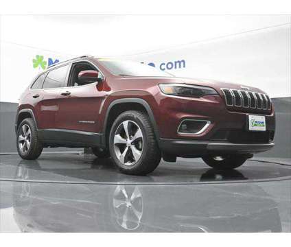 2020 Jeep Cherokee Limited 4X4 is a Red 2020 Jeep Cherokee Limited SUV in Dubuque IA