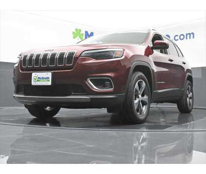 2020 Jeep Cherokee Limited 4X4 is a Red 2020 Jeep Cherokee Limited SUV in Dubuque IA